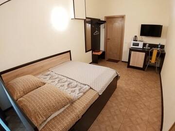 Фото номера Улучшенный двухместный номер с 1 кроватью Отель Sitara Hotel г. Тверь 2