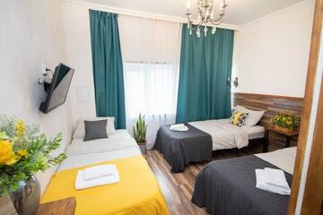 Фото номера Трехместный улучшенный номер. Отель Lemon Loft г. Тверь 4