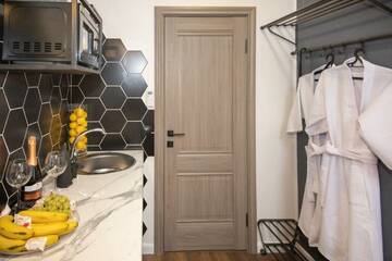 Фото номера 2-местный номер студия премиум (мансарда) Отель Lemon Loft г. Тверь 31