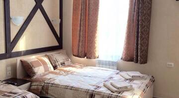 Фото номера Улучшенный трехместный номер Гостевой дом GuestHouse г. Тверь 2
