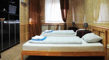 Фото номера Двухместный номер с 2 отдельными кроватями Гостевой дом Proletarskaya Inn г. Тверь 6