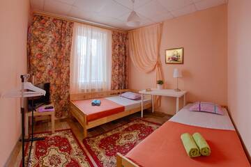Фото номера Односпальная кровать в общем номере с 2 кроватями Хостел Arbuz Hostel г. Тверь 4